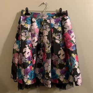 Multi-colored skirt with tulle underlay.